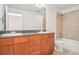 Bathroom with double vanity, granite countertop and a bathtub at 3601 Arapahoe Ave # 226, Boulder, CO 80303
