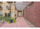 Building entrance with walkway and bicycle at 3601 Arapahoe Ave # 226, Boulder, CO 80303