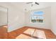 Spacious bedroom with hardwood floors and a large window at 3601 Arapahoe Ave # 226, Boulder, CO 80303