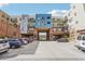 Building entryway with parking area and landscaping at 3601 Arapahoe Ave # 226, Boulder, CO 80303