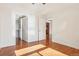 Bedroom with hardwood floors and access to a walk-in closet at 3601 Arapahoe Ave # 226, Boulder, CO 80303