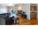 Living room with hardwood floors, stone fireplace and access to backyard at 2386 Creek Valley Cir, Monument, CO 80132