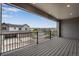 Spacious balcony with composite decking and neighborhood views at 16728 W 93Rd Pl, Arvada, CO 80007