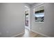 Bright bedroom with access to balcony and neutral decor at 16728 W 93Rd Pl, Arvada, CO 80007