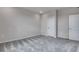 Simple bedroom with neutral walls and carpet flooring at 16728 W 93Rd Pl, Arvada, CO 80007