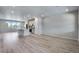 Open concept kitchen with island and stainless steel appliances at 16728 W 93Rd Pl, Arvada, CO 80007