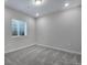 Spacious bedroom with carpet and window at 16728 W 93Rd Pl, Arvada, CO 80007