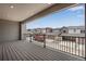 Covered balcony overlooking community and neighborhood at 16728 W 93Rd Pl, Arvada, CO 80007