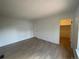 Bright bedroom with wood-look floors and spacious closet at 3581 S Olathe St, Aurora, CO 80013