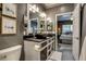 Modern bathroom with double vanity and walk-in shower at 8055 W Eastman Pl # 104, Lakewood, CO 80227