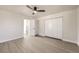 Well-lit bedroom with large closet and access to hallway at 4527 Starboard Ct, Boulder, CO 80301