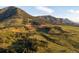 Aerial view of lot with mountain backdrop at 63 Canyon Pines Dr, Arvada, CO 80403