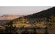 View of mountains and valley from hillside lot at 63 Canyon Pines Dr, Arvada, CO 80403