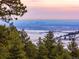 Cityscape view from mountain top with snow at 63 Canyon Pines Dr, Arvada, CO 80403