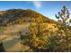 Scenic view of mountainside with golden hour light at 63 Canyon Pines Dr, Arvada, CO 80403