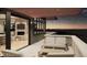 Spacious deck with seating area and fireplace, offering scenic views at 63 Canyon Pines Dr, Arvada, CO 80403