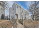 Exterior view of charming townhome with stone accents and landscaping at 11103 E Alameda Ave # 102, Aurora, CO 80012