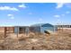 Animal pens with sheds and a large fenced area at 11286 County Road 49, Hudson, CO 80642
