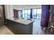Bright living room with floor to ceiling windows and city views at 1020 15Th St # 40M, Denver, CO 80202