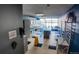 Well-equipped laundry room with multiple washers and dryers at 1020 15Th St # 40M, Denver, CO 80202