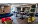 Community room with comfortable seating, tables, and plants at 1020 15Th St # 40M, Denver, CO 80202