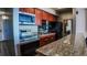 Updated kitchen featuring granite countertops and stainless steel appliances at 1020 15Th St # 40M, Denver, CO 80202