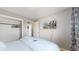 Spacious bedroom with a king-size bed and ample closet space at 1852 S Forest St, Denver, CO 80222