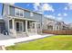 View of backyard, showing patio and grassy yard at 26346 E Canal Pl, Aurora, CO 80018