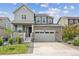 Two-story house with a gray and teal exterior at 26346 E Canal Pl, Aurora, CO 80018