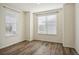 Bright bedroom with wood flooring and window blinds at 26346 E Canal Pl, Aurora, CO 80018