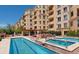 Resort-style pool and hot tub with comfortable lounge chairs at 2500 E Cherry Creek South Dr # 414, Denver, CO 80209