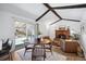 Charming dining area with wood floors and exposed beams at 3417 S Chester Ct, Denver, CO 80231