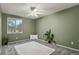 Bright bedroom with a window at 13935 Harrison Dr, Thornton, CO 80602