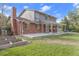 Brick ranch house with large backyard and patio at 3872 S Xanthia St, Denver, CO 80237