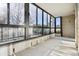 Enclosed balcony with large windows offering views of the golf course at 13901 E Marina Dr # 109, Aurora, CO 80014