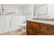 Bathroom featuring a walk-in tub and grab bars for accessibility at 13901 E Marina Dr # 109, Aurora, CO 80014