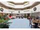 Welcoming lobby area with seating, festive decorations, and plenty of natural light at 13901 E Marina Dr # 109, Aurora, CO 80014