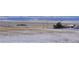 Snowy landscape with distant mountain views at 35100 E 120Th Ave, Hudson, CO 80642