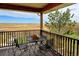 Deck with table and chairs, offering scenic views at 35100 E 120Th Ave, Hudson, CO 80642