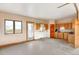 Kitchen with wood cabinets and access to outdoor space at 35100 E 120Th Ave, Hudson, CO 80642