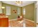 Cozy bedroom with hardwood floors and a desk area at 35100 E 120Th Ave, Hudson, CO 80642