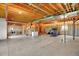 Unfinished basement with plumbing and electrical rough-in at 35100 E 120Th Ave, Hudson, CO 80642