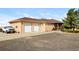 Ranch style home with attached three-car garage and spacious driveway at 35100 E 120Th Ave, Hudson, CO 80642