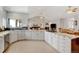 Open concept kitchen with island and breakfast bar, overlooking living area at 35100 E 120Th Ave, Hudson, CO 80642