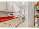 Laundry room with washer, dryer, and ample storage at 35100 E 120Th Ave, Hudson, CO 80642