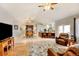 Spacious living room with hardwood floors, fireplace and high ceilings at 35100 E 120Th Ave, Hudson, CO 80642