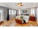Spacious main bedroom with hardwood floors and large windows at 35100 E 120Th Ave, Hudson, CO 80642