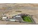 Aerial view of a house on a large lot with a long driveway at 35100 E 120Th Ave, Hudson, CO 80642
