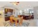 Eat-in kitchen with an island, hardwood floors, and ample cabinet space at 35100 E 120Th Ave, Hudson, CO 80642