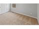 Bright bedroom with neutral carpeting and double door closet at 2224 Alyssa St, Fort Lupton, CO 80621